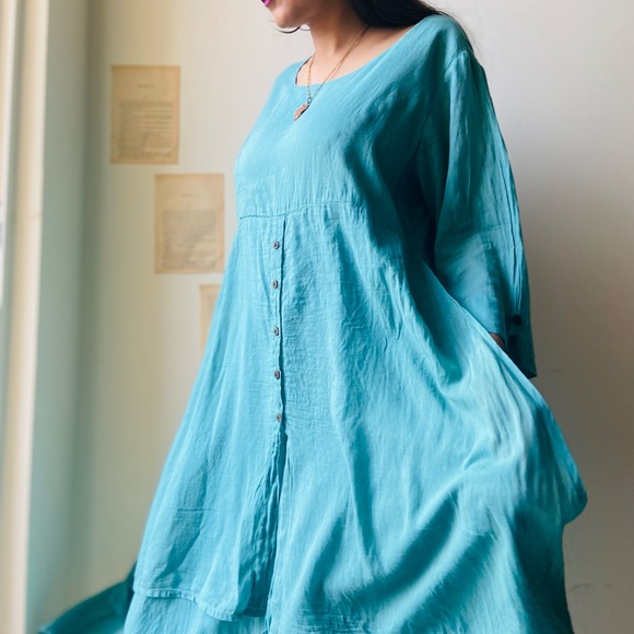 Turquoise long fit dress.